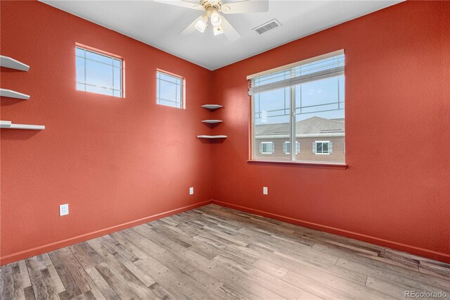 847 E 98th Ave Unit 1806, Thornton, CO 80229 - empty room featuring a ceiling fan, wood finished floors, and baseboards