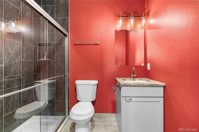 847 E 98th Ave Unit 1806, Thornton, CO 80229 - bathroom with toilet, vanity, and a shower stall