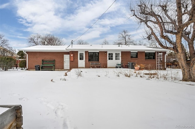 view of snow covered property