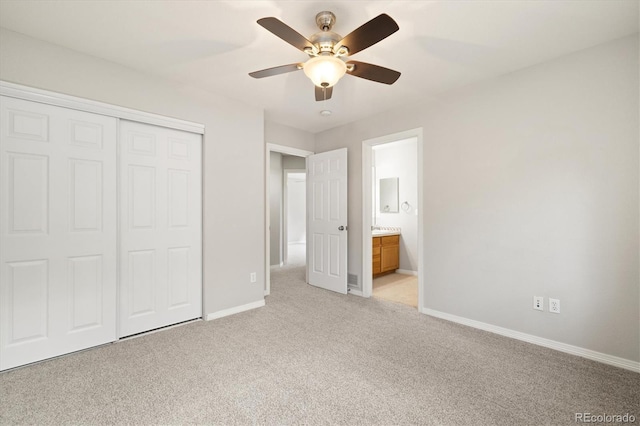 3901 Stonegrass Pt, Broomfield, CO 80023 - unfurnished bedroom with light carpet, a closet, ceiling fan, and ensuite bathroom