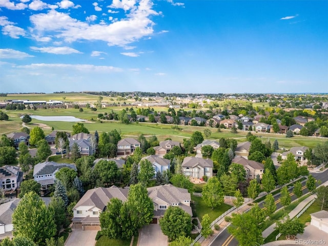 3901 Stonegrass Pt, Broomfield, CO 80023 - aerial perspective of suburban area with a golf club and a large body of water