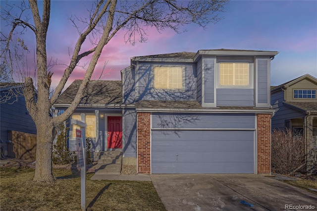 front of property featuring a garage