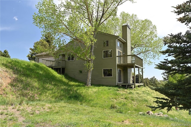 23846 Genesee Village Rd, Golden, CO 80401 - view of home's exterior with a chimney