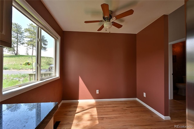 23846 Genesee Village Rd, Golden, CO 80401 - empty room featuring a ceiling fan, baseboards, and light wood-style floors