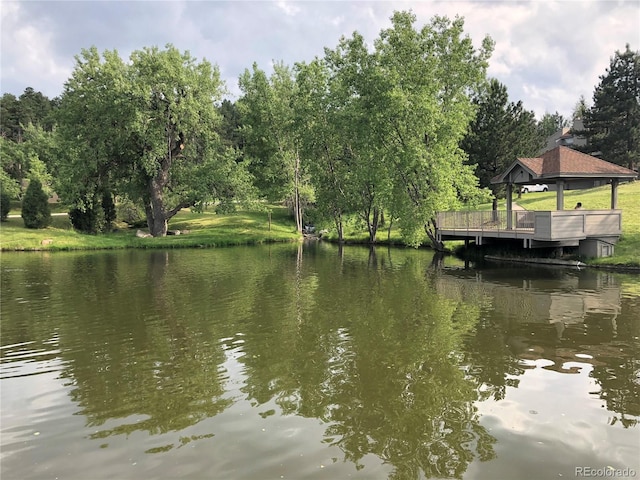 23846 Genesee Village Rd, Golden, CO 80401 - water view with a gazebo and a tree filled landscape