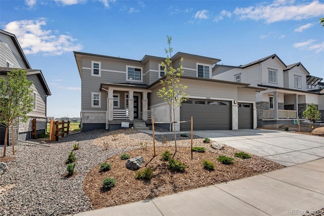 view of front facade featuring concrete driveway and fence