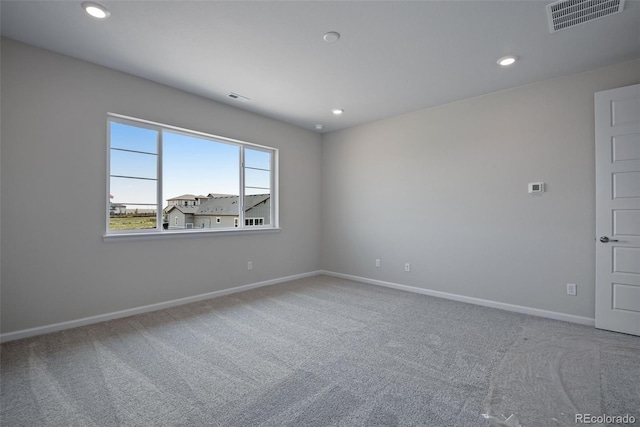 view of carpeted spare room