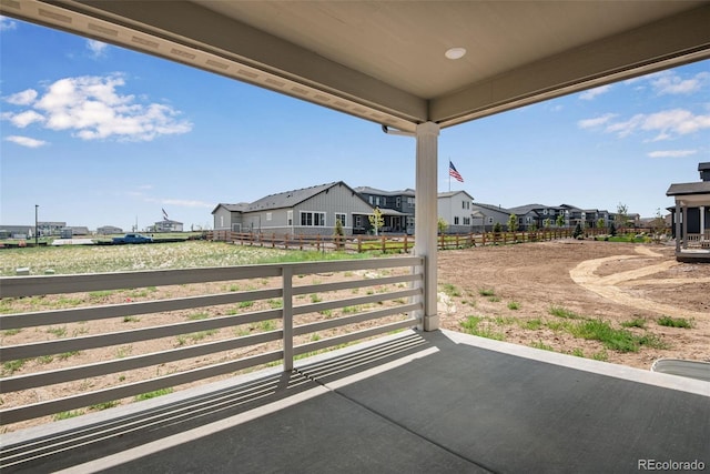 view of patio with a residential view