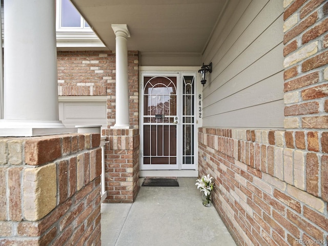 6432 S Robb Ct, Littleton, CO 80127 - entrance to property with brick siding