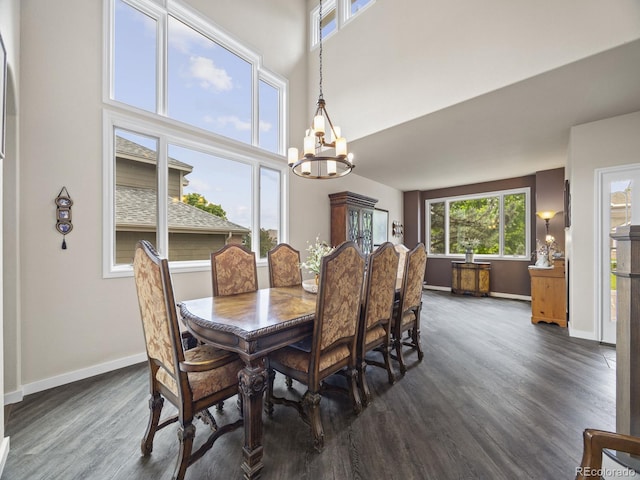 6432 S Robb Ct, Littleton, CO 80127 - dining room featuring a chandelier, dark wood-style floors, baseboards, and a high ceiling