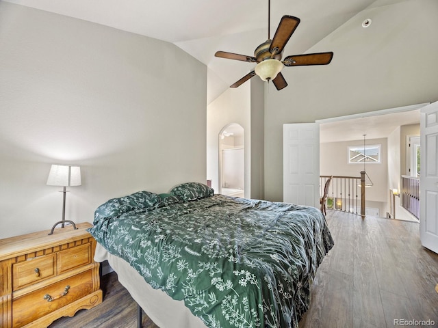 6432 S Robb Ct, Littleton, CO 80127 - bedroom with wood finished floors, arched walkways, high vaulted ceiling, and ceiling fan