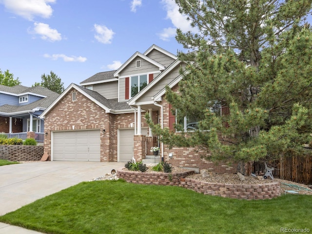 6432 S Robb Ct, Littleton, CO 80127 - view of front of property featuring brick siding, concrete driveway, and roof with shingles