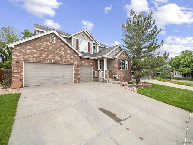 6432 S Robb Ct, Littleton, CO 80127 - craftsman house featuring brick siding, driveway, and a shingled roof