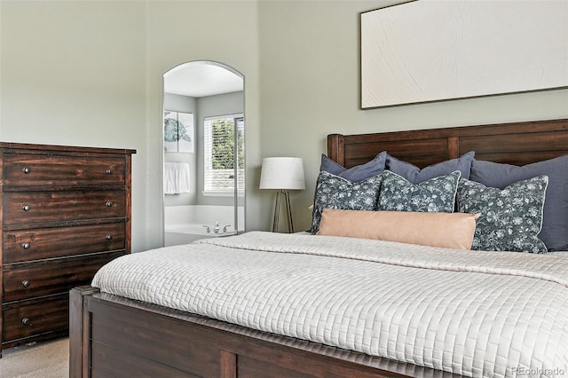 3543 Foxridge Trl, Highlands Ranch, CO 80126 - bedroom featuring arched walkways and light carpet