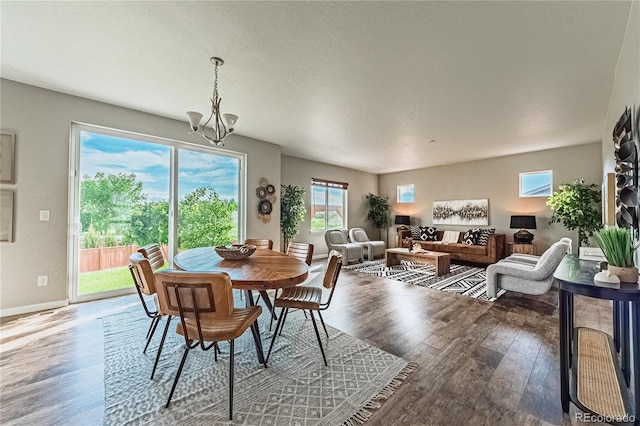 638 W 175th Ave, Broomfield, CO 80023 - dining room with wood finished floors and a chandelier