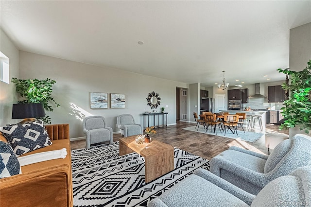 638 W 175th Ave, Broomfield, CO 80023 - living area with a chandelier, wood finished floors, and recessed lighting