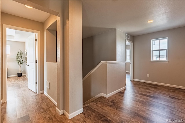 638 W 175th Ave, Broomfield, CO 80023 - corridor with wood finished floors and an upstairs landing