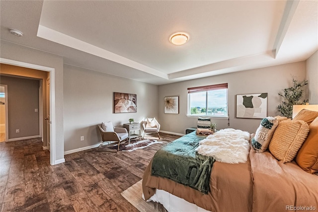 638 W 175th Ave, Broomfield, CO 80023 - bedroom with a raised ceiling and wood finished floors
