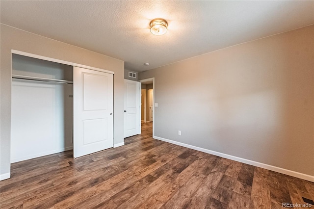 638 W 175th Ave, Broomfield, CO 80023 - unfurnished bedroom featuring a closet and wood finished floors