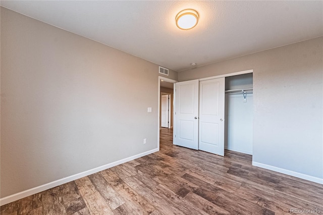 638 W 175th Ave, Broomfield, CO 80023 - unfurnished bedroom featuring wood finished floors and a closet