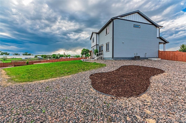 638 W 175th Ave, Broomfield, CO 80023 - view of home's exterior featuring a cooling unit and board and batten siding