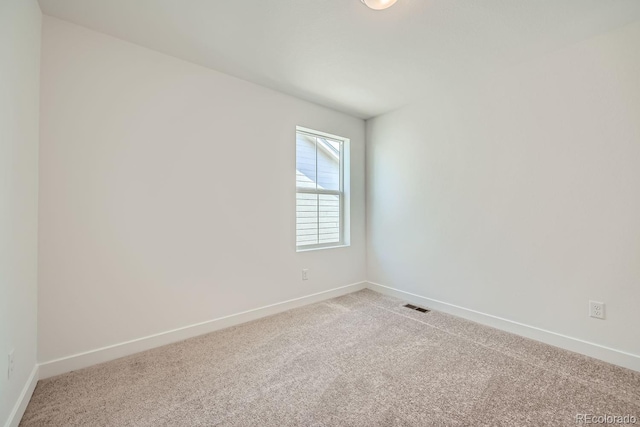 empty room with carpet floors