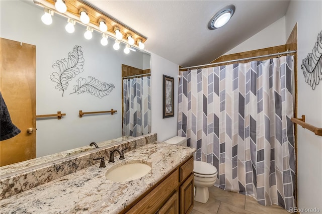 91200 Ryan Gulch Rd Unit 91222, Silverthorne, CO 80498 - full bathroom with vanity, toilet, tile patterned floors, curtained shower, and vaulted ceiling