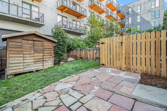 2530 Kensing Ct, Denver, CO 80211 - view of patio / terrace with a storage unit