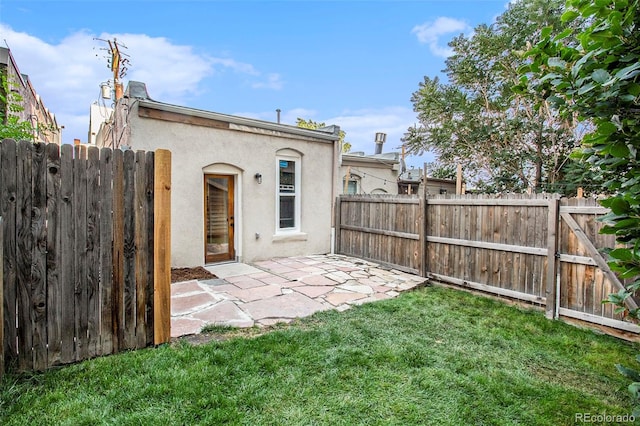 2530 Kensing Ct, Denver, CO 80211 - fenced backyard featuring a patio