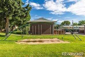 9263 E Nassau Ave, Denver, CO 80237 - view of property's community featuring a yard