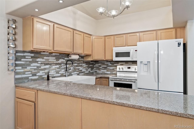 4195 W 111th Cir, Westminster, CO 80031 - kitchen featuring white appliances, light brown cabinets, a sink, backsplash, and recessed lighting