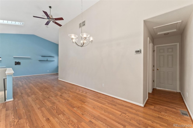4195 W 111th Cir, Westminster, CO 80031 - empty room featuring light wood-type flooring, ceiling fan, lofted ceiling, baseboards, and a chandelier