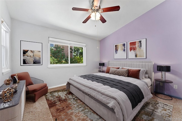 4195 W 111th Cir, Westminster, CO 80031 - bedroom featuring baseboards, multiple windows, vaulted ceiling, and a ceiling fan