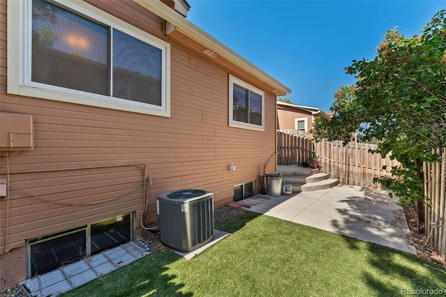 4195 W 111th Cir, Westminster, CO 80031 - view of side of home featuring central AC and a patio