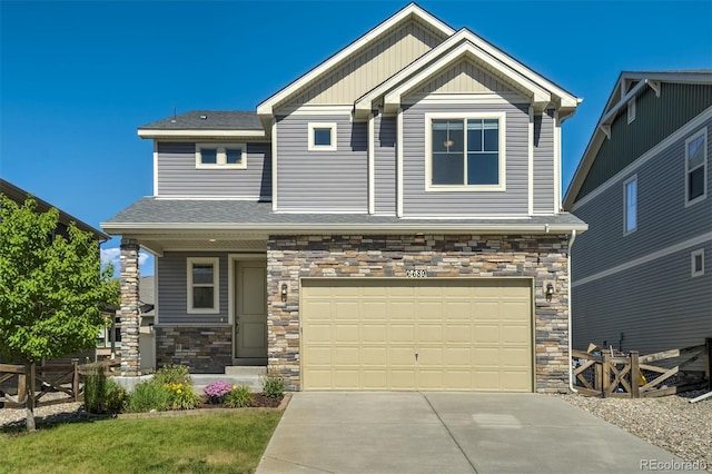 6689 Backcountry Loop, Colorado Springs, CO 80927 - craftsman-style house featuring stone siding, concrete driveway, an attached garage, and board and batten siding