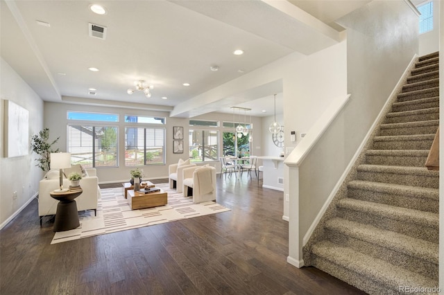6689 Backcountry Loop, Colorado Springs, CO 80927 - living area with wood finished floors, stairs, recessed lighting, and a chandelier