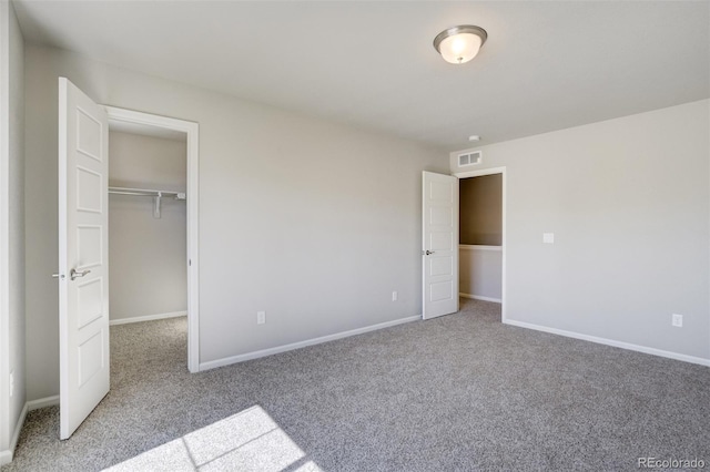 6689 Backcountry Loop, Colorado Springs, CO 80927 - unfurnished bedroom with carpet floors, a walk in closet, and a closet
