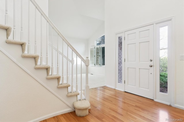 entrance foyer featuring hardwood / wood-style floors