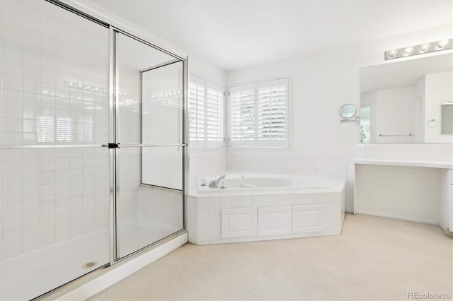 bathroom with independent shower and bath