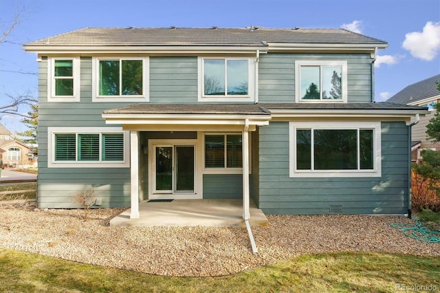 back of house with a patio area