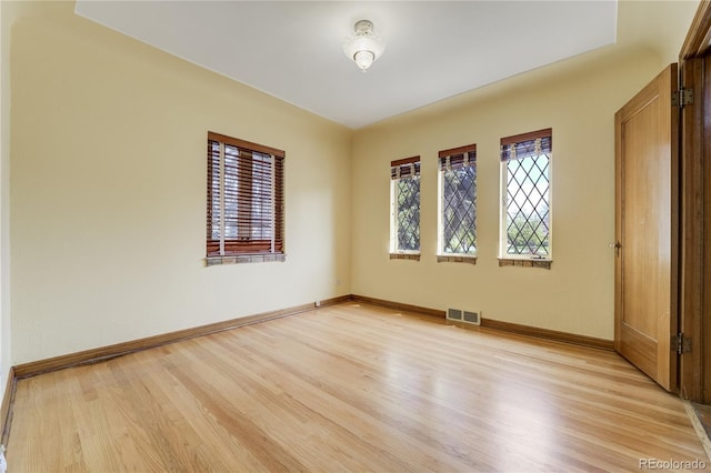 2285 N Monaco Pkwy, Denver, CO 80207 - unfurnished room featuring light wood-style flooring and baseboards