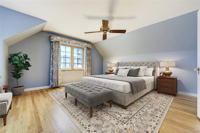 2285 N Monaco Pkwy, Denver, CO 80207 - bedroom featuring baseboards, vaulted ceiling, light wood-type flooring, and ceiling fan