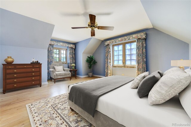 2285 N Monaco Pkwy, Denver, CO 80207 - bedroom featuring light wood-style floors, lofted ceiling, ceiling fan, and baseboards