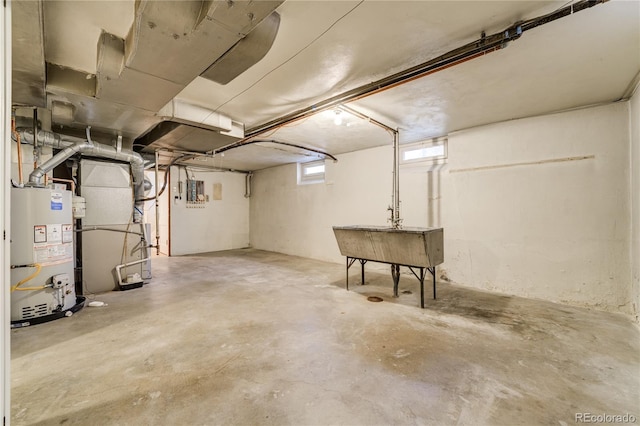 2285 N Monaco Pkwy, Denver, CO 80207 - below grade area featuring gas water heater and heating unit
