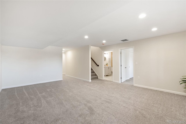 basement with light carpet