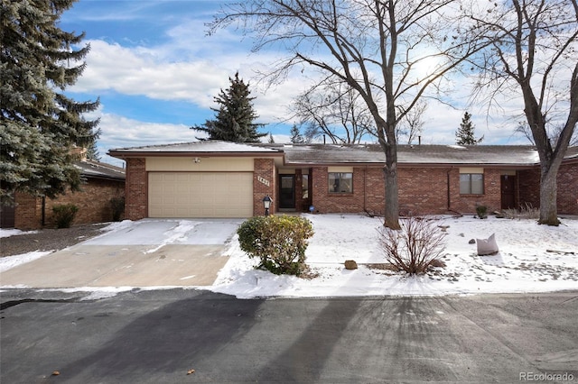 single story home with a garage