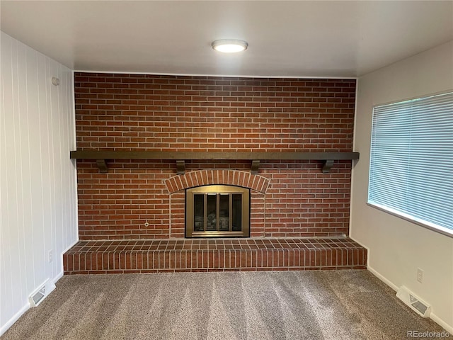 4115 S Vincennes Ct, Denver, CO 80237 - unfurnished living room featuring carpet floors, baseboards, and a fireplace