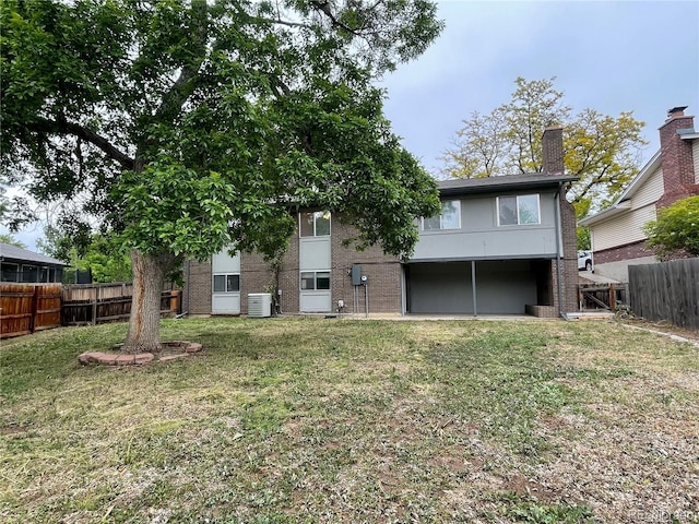 4115 S Vincennes Ct, Denver, CO 80237 - back of property featuring brick siding and central air condition unit