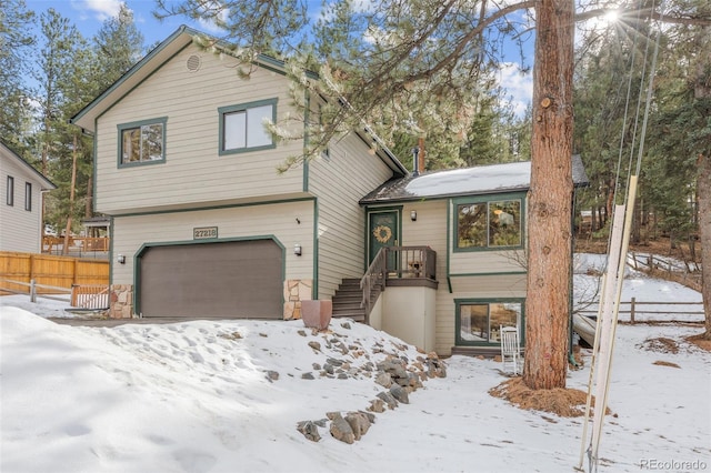 front of property with a garage