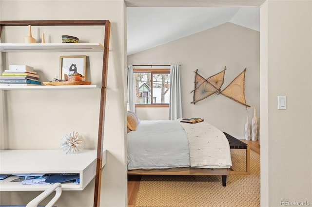 bedroom with vaulted ceiling